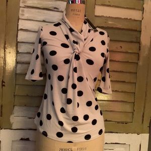 black polka dotted blouse